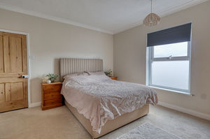 Bedroom One- click for photo gallery